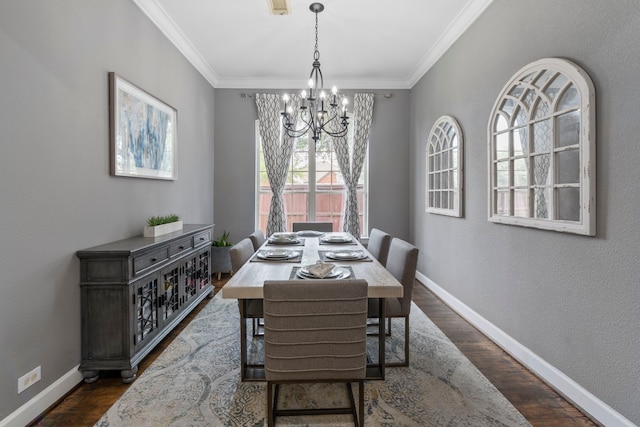 9523 Sapphire Hill Ln, Katy, TX 77494 - dining room with a chandelier, dark wood-style floors, and ornamental molding