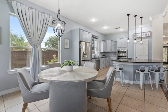 9523 Sapphire Hill Ln, Katy, TX 77494 - dining room with light tile patterned flooring, a chandelier, and recessed lighting