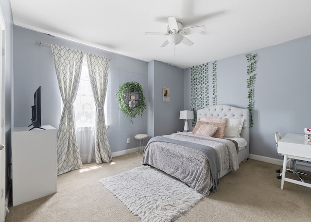 9523 Sapphire Hill Ln, Katy, TX 77494 - carpeted bedroom with a ceiling fan and baseboards