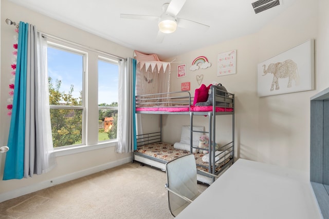 9523 Sapphire Hill Ln, Katy, TX 77494 - carpeted bedroom featuring multiple windows and a ceiling fan