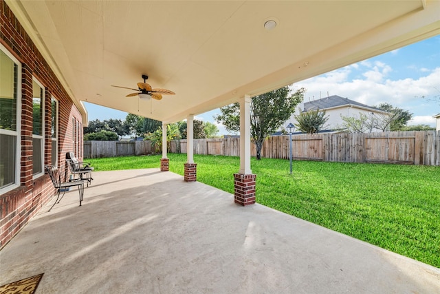 21739 W Mulberry Field Cir, Cypress, TX 77433 - fenced backyard with a patio area and ceiling fan