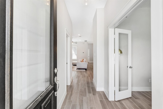 18519 Parkland Row Dr, Cypress, TX 77433 - entryway with light wood-type flooring and baseboards