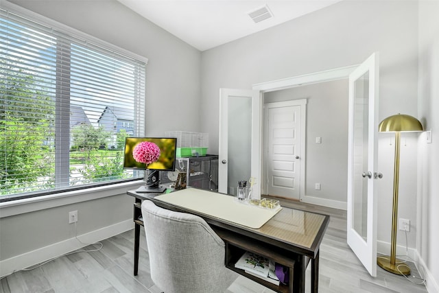 18519 Parkland Row Dr, Cypress, TX 77433 - office area featuring plenty of natural light and light wood finished floors
