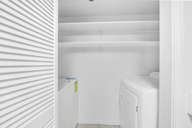 3525 Sage Rd Unit 813, Houston, TX 77056 - laundry area with washer and dryer