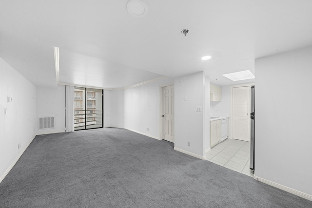 3525 Sage Rd Unit 813, Houston, TX 77056 - unfurnished room with light carpet and a pendent fire sprinkler