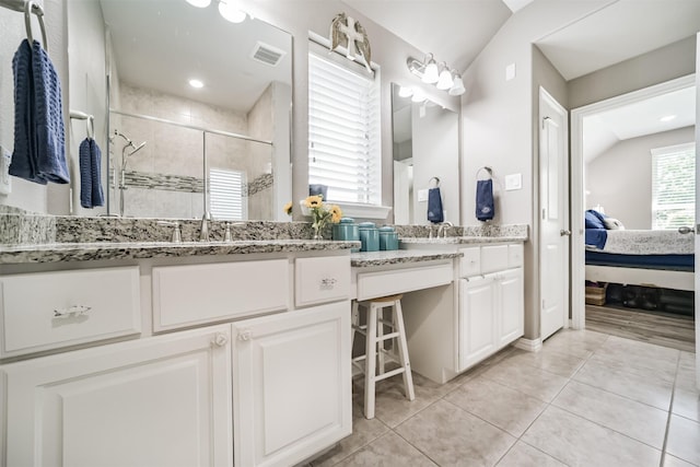 30806 Meadow Wood Dr, Fulshear, TX 77441 - full bathroom with ensuite bathroom, a stall shower, vanity, and tile patterned flooring