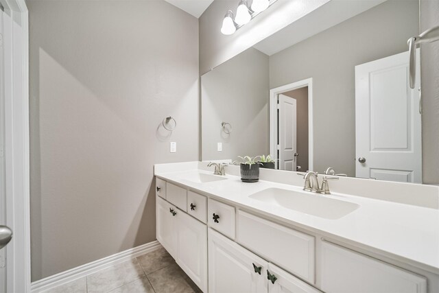 30806 Meadow Wood Dr, Fulshear, TX 77441 - bathroom with double vanity and tile patterned floors