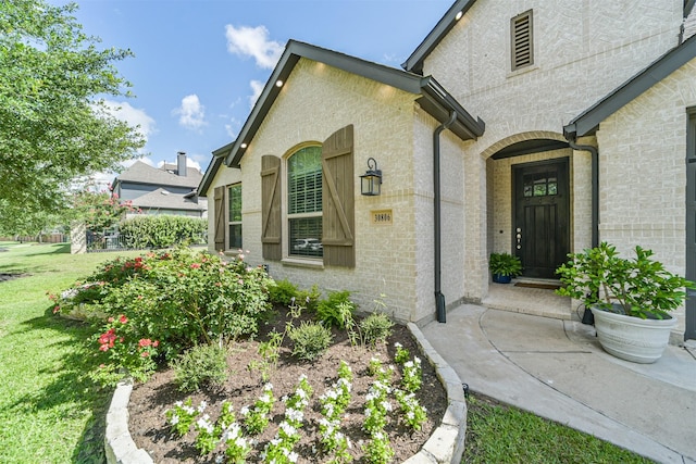 30806 Meadow Wood Dr, Fulshear, TX 77441 - entrance to property featuring a yard and stucco siding