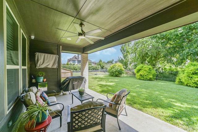 30806 Meadow Wood Dr, Fulshear, TX 77441 - fenced backyard with a ceiling fan, a patio, an outdoor hangout area, and grilling area
