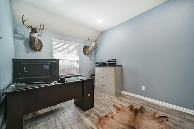 30806 Meadow Wood Dr, Fulshear, TX 77441 - office area with light wood finished floors and baseboards