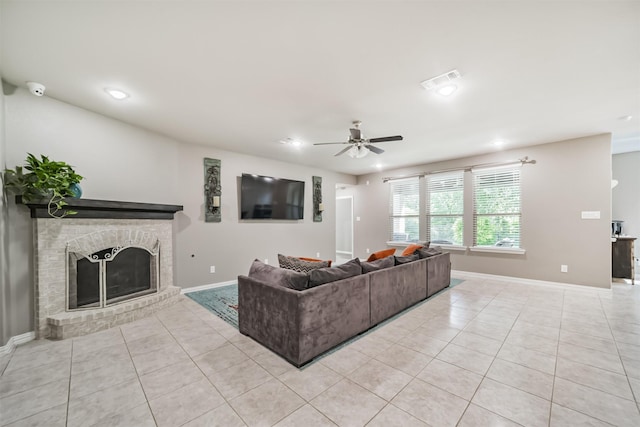 30806 Meadow Wood Dr, Fulshear, TX 77441 - living area featuring light tile patterned flooring, a ceiling fan, recessed lighting, and a fireplace