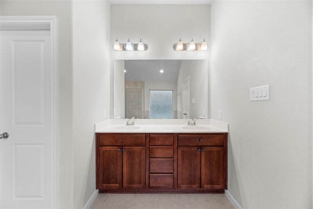 31222 S Pinebrook Falls Ln S, Hockley, TX 77447 - full bath featuring double vanity, a tile shower, and tile patterned floors
