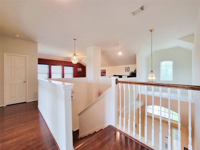 11811 Champions Grove Ln, Houston, TX 77066 - hallway featuring an upstairs landing, vaulted ceiling, and dark wood finished floors