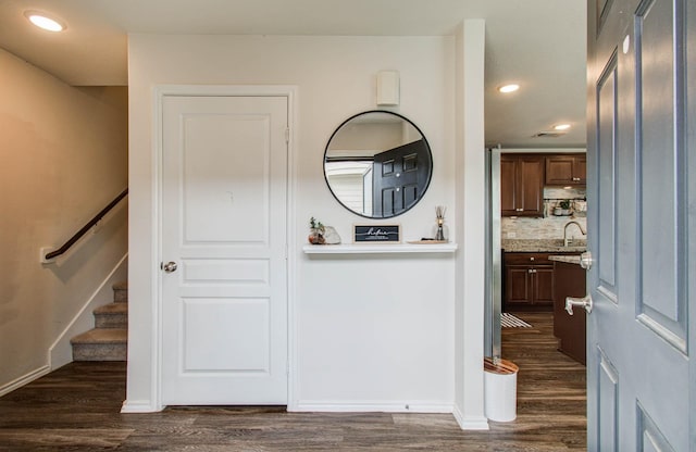 14746 Jasper Stream Ct, Houston, TX 77069 - hall featuring dark wood-style flooring, stairway, and recessed lighting