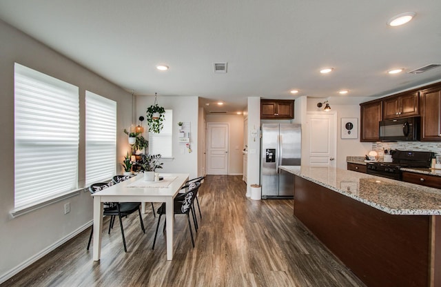 14746 Jasper Stream Ct, Houston, TX 77069 - dining space featuring dark wood-type flooring and recessed lighting