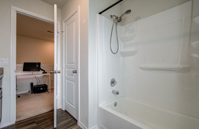 14746 Jasper Stream Ct, Houston, TX 77069 - full bathroom with wood finished floors, shower / bath combination, and vanity