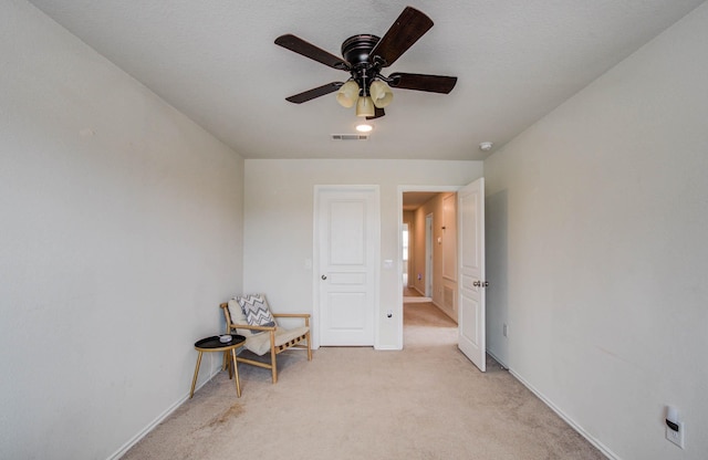 14746 Jasper Stream Ct, Houston, TX 77069 - living area with light colored carpet and a ceiling fan