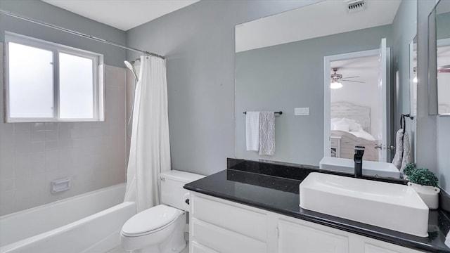 2608 Bering Dr Unit 2608, Houston, TX 77057 - ensuite bathroom featuring vanity, shower / bath combination with curtain, and a ceiling fan
