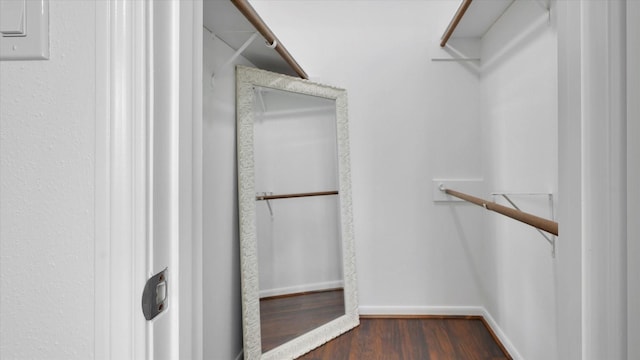 2608 Bering Dr Unit 2608, Houston, TX 77057 - walk in closet featuring dark wood finished floors