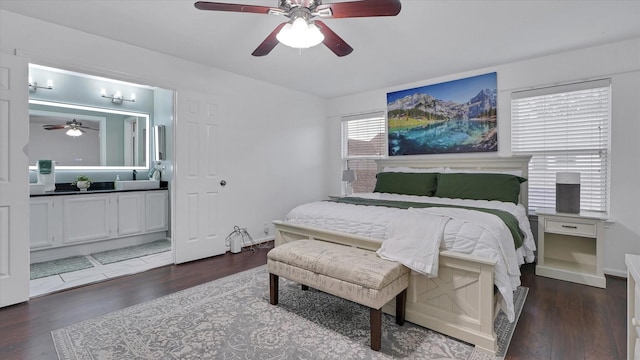 2608 Bering Dr Unit 2608, Houston, TX 77057 - bedroom with dark wood-style floors, ensuite bath, and ceiling fan