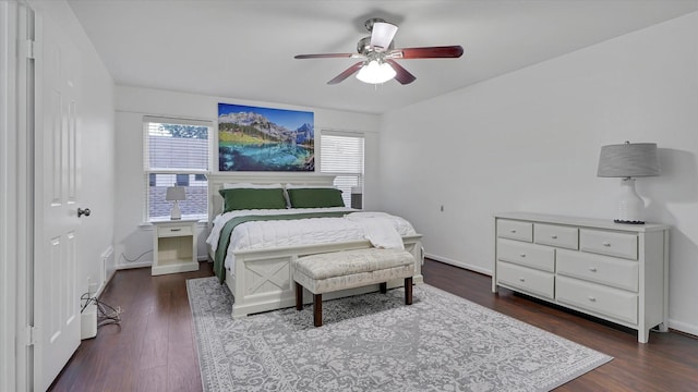 2608 Bering Dr Unit 2608, Houston, TX 77057 - bedroom featuring multiple windows, dark wood-type flooring, and ceiling fan