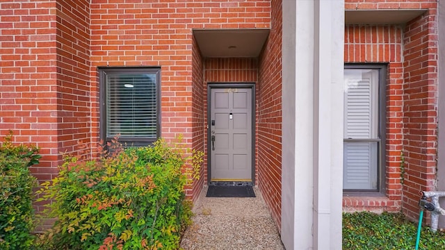 2608 Bering Dr Unit 2608, Houston, TX 77057 - doorway to property featuring brick siding