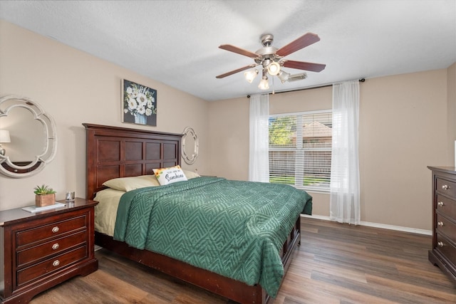 14007 Blackfoot Trail Run, Cypress, TX 77429 - bedroom with wood finished floors and a ceiling fan