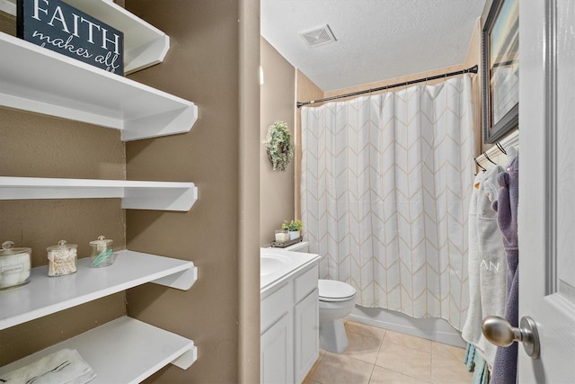 14007 Blackfoot Trail Run, Cypress, TX 77429 - full bathroom with vanity, tile patterned floors, shower / bathtub combination with curtain, and a textured ceiling