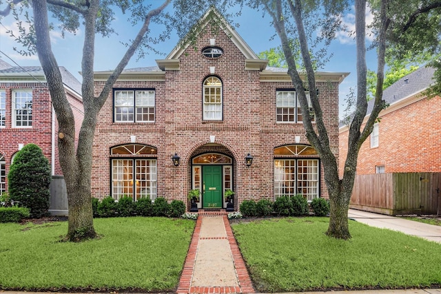 3827 Marquette St, West University Place, TX 77005 - colonial-style house featuring brick siding