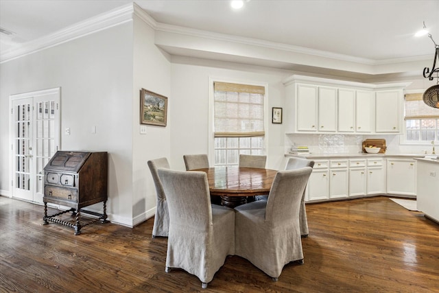 3827 Marquette St, West University Place, TX 77005 - dining room with ornamental molding and dark wood finished floors