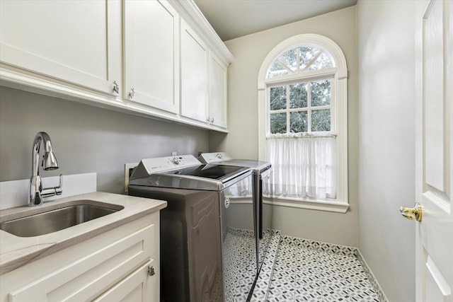 3827 Marquette St, West University Place, TX 77005 - laundry room featuring cabinet space and independent washer and dryer
