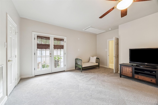 3827 Marquette St, West University Place, TX 77005 - sitting room with attic access, light carpet, a ceiling fan, and french doors