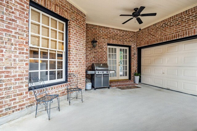 3827 Marquette St, West University Place, TX 77005 - view of patio featuring area for grilling, french doors, a ceiling fan, and concrete driveway