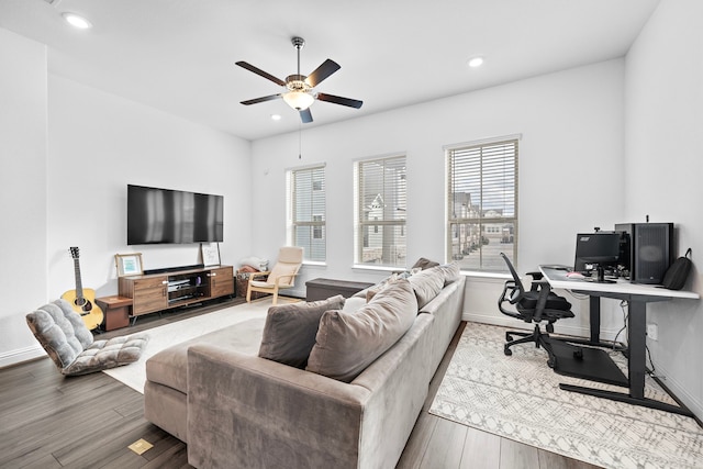 11008 Mikula Dr, Houston, TX 77043 - living room with wood finished floors, a desk, a ceiling fan, and recessed lighting