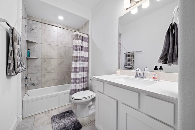 11008 Mikula Dr, Houston, TX 77043 - bathroom featuring vanity, shower / bath combo, and tile patterned flooring