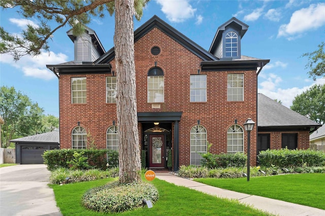 8002 Laguna Springs Ct, Houston, TX 77095 - view of front of home featuring brick siding, a front lawn, and roof with shingles