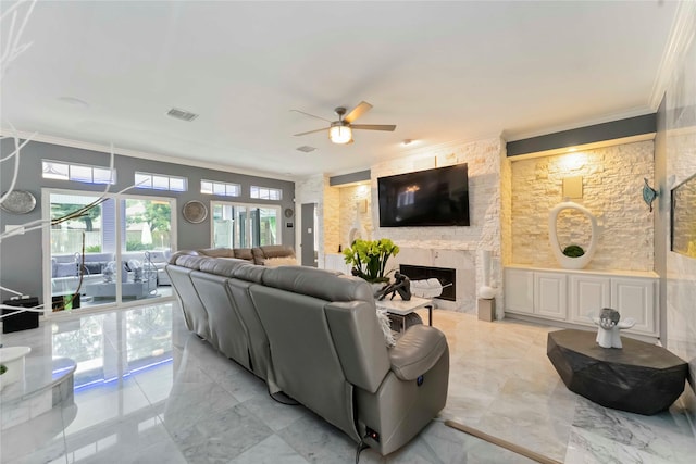 8002 Laguna Springs Ct, Houston, TX 77095 - living room featuring a ceiling fan, crown molding, a fireplace, and light marble finish flooring