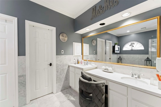 8002 Laguna Springs Ct, Houston, TX 77095 - bathroom featuring tile walls, ornamental molding, vanity, wainscoting, and marble finish floors