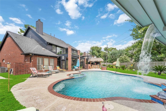 8002 Laguna Springs Ct, Houston, TX 77095 - view of swimming pool with a patio and a pool with connected hot tub