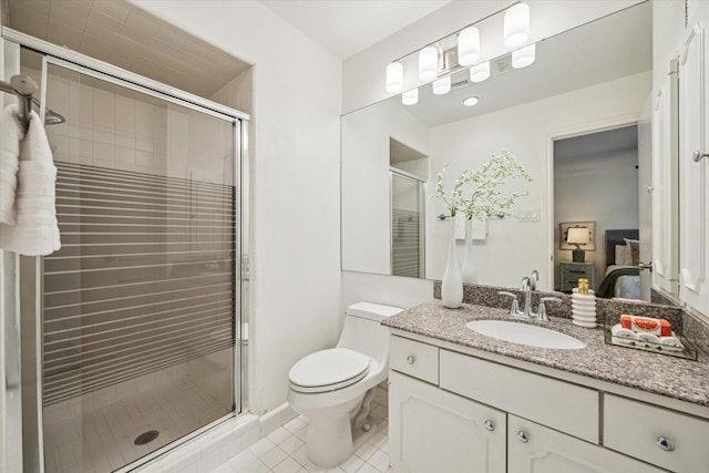 1228 Fountain View Dr Unit 180, Houston, TX 77057 - bathroom featuring tile patterned floors, vanity, and a stall shower