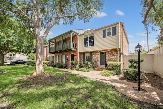 1228 Fountain View Dr Unit 180, Houston, TX 77057 - view of property featuring a balcony and brick siding