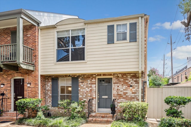 1228 Fountain View Dr Unit 180, Houston, TX 77057 - view of property featuring brick siding and a balcony