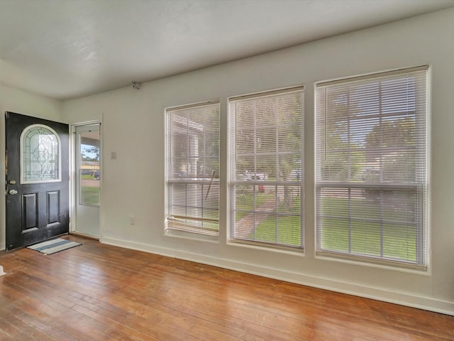 1214 W 6th St, Freeport, TX 77541 - foyer entrance featuring hardwood / wood-style flooring