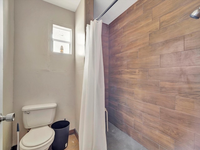 1214 W 6th St, Freeport, TX 77541 - bathroom with toilet and tiled shower