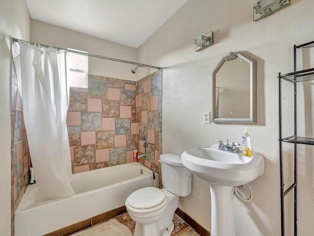1214 W 6th St, Freeport, TX 77541 - bathroom with shower / bath combo and toilet