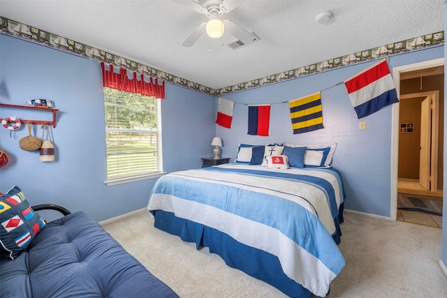 1831 Lakeview Estates Dr, Coldspring, TX 77331 - bedroom with a textured ceiling, carpet flooring, and ceiling fan