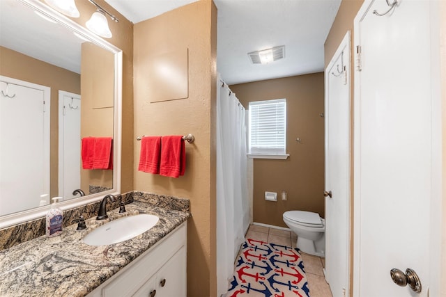 1831 Lakeview Estates Dr, Coldspring, TX 77331 - full bathroom featuring vanity, tile patterned flooring, and a shower with curtain