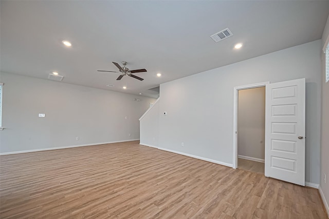 14979 Eagle Feather Dr, Houston, TX 77090 - unfurnished room featuring light wood-style flooring, ceiling fan, and recessed lighting
