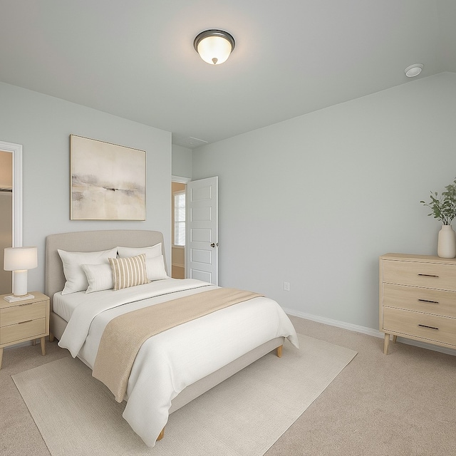 14979 Eagle Feather Dr, Houston, TX 77090 - bedroom featuring light colored carpet and baseboards