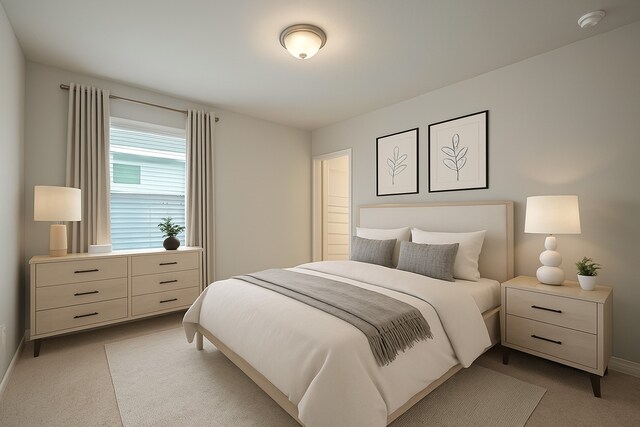 14979 Eagle Feather Dr, Houston, TX 77090 - bedroom featuring light colored carpet and baseboards